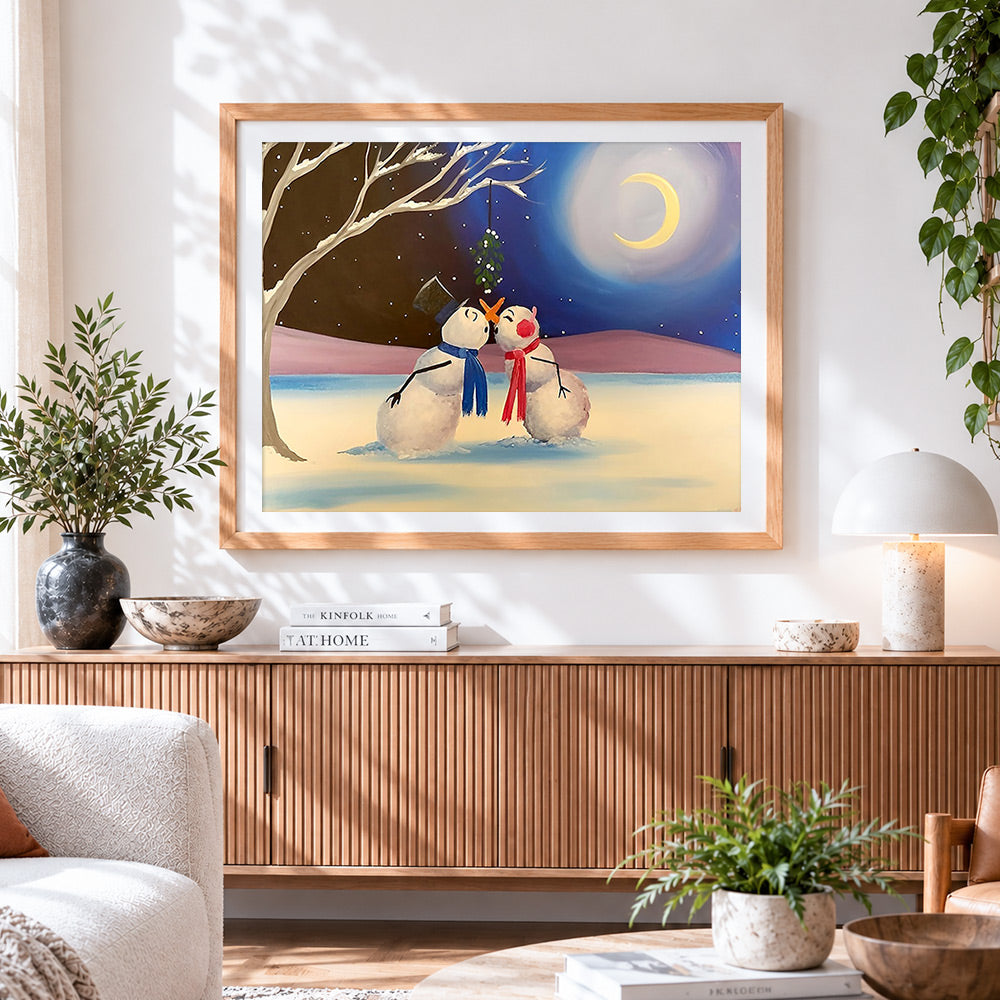 Finished snowmen kissing under the mistletoe cross stitch artwork displayed