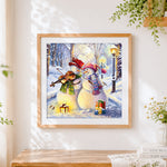 Finished snowmen playing violin in winter cross stitch artwork displayed