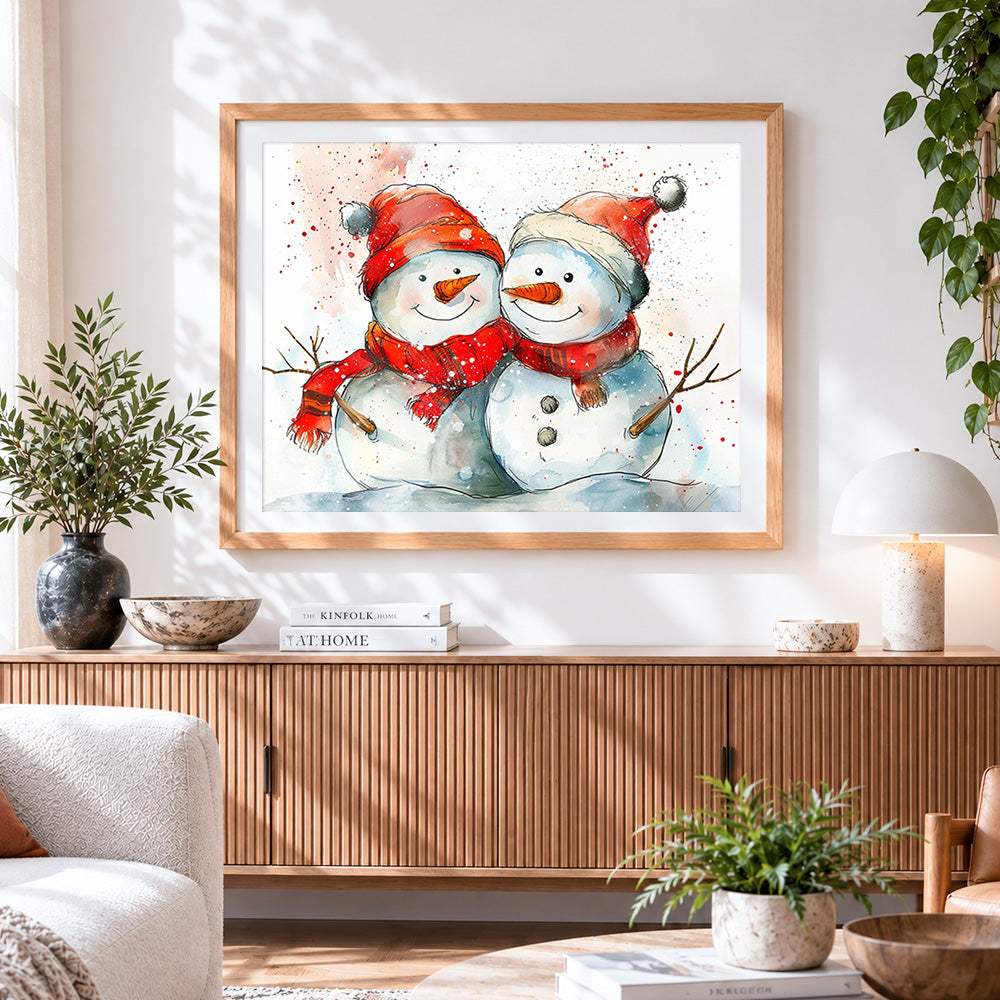 Finished snowmen with red scarves cross stitch artwork displayed