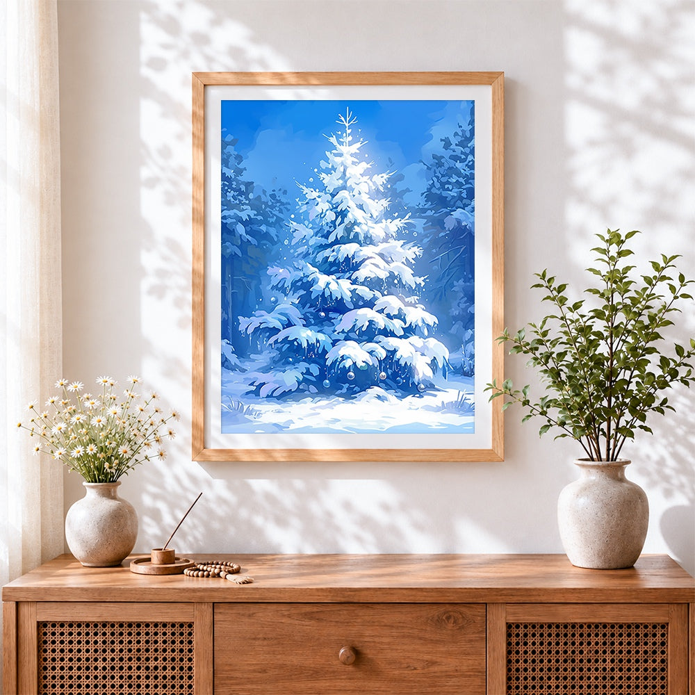 Finished snowy blue christmas tree cross stitch artwork displayed