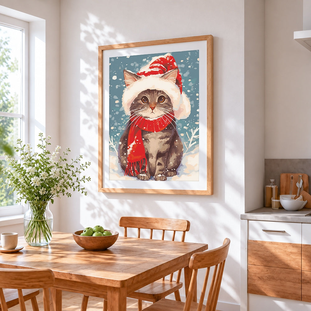 Snowy cat with red santa scarf cross stitch artwork displayed on wall as home decor