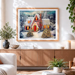 Finished snowy christmas cottage with warm glowing lights cross stitch artwork displayed