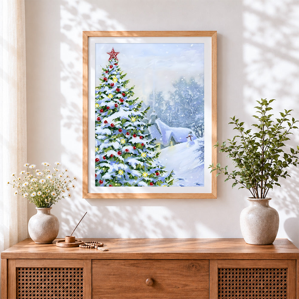 Finished snowy christmas tree and snowman cross stitch artwork displayed