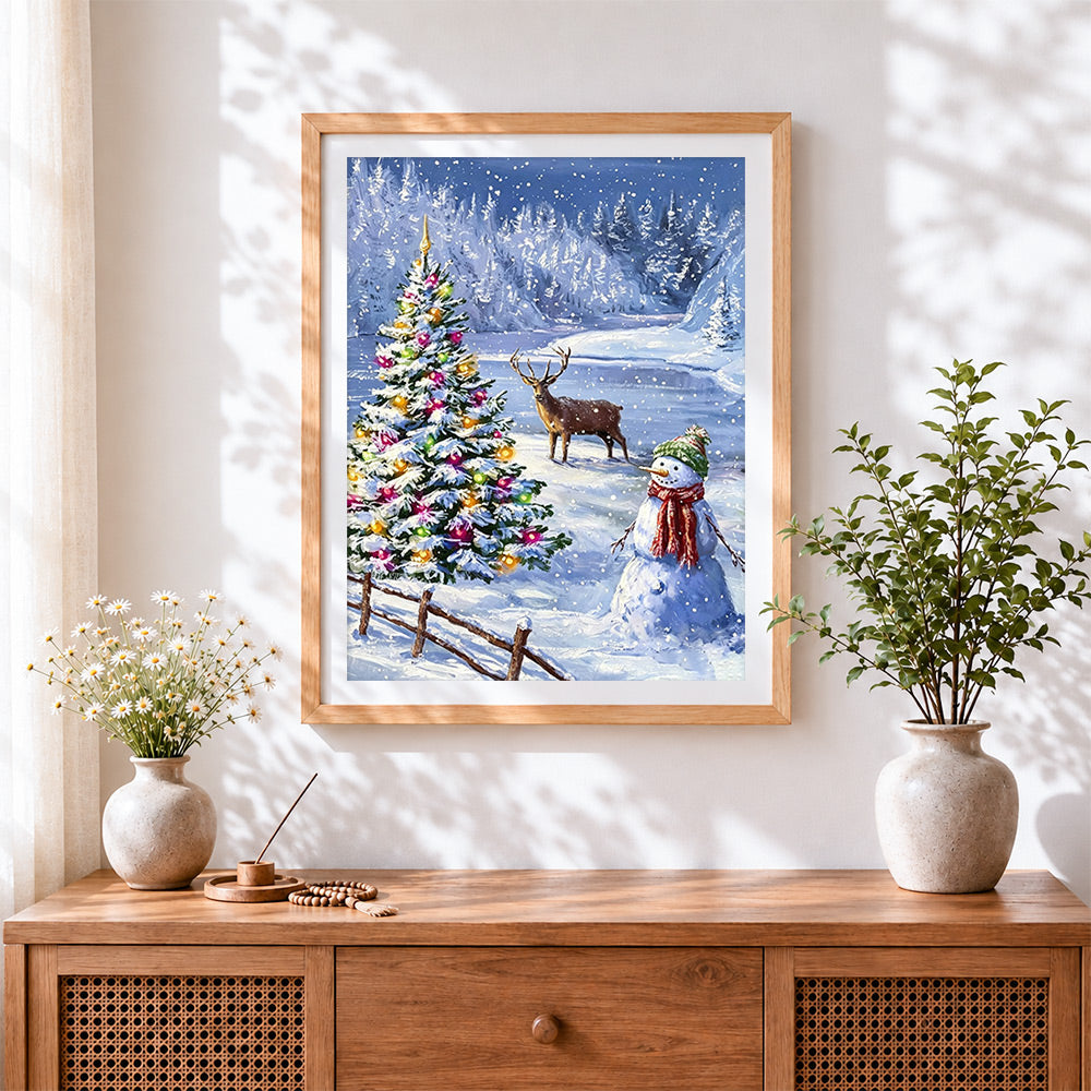 Finished snowy christmas tree, reindeer and snowman cross stitch artwork displayed