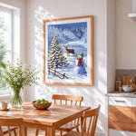 Snowy christmas tree, reindeer and snowman cross stitch artwork displayed on wall as home decor