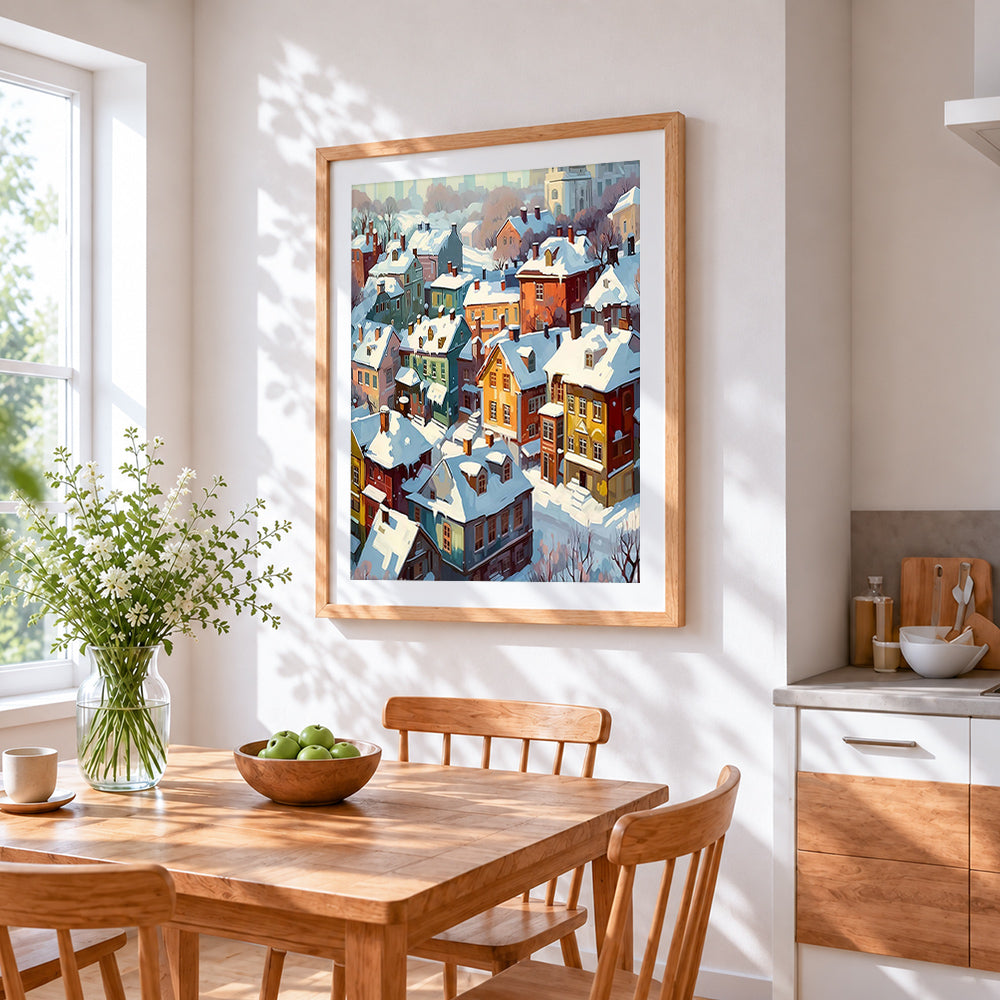 Snowy colourful village rooftops cross stitch artwork displayed on wall as home decor