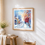 Snowy european street with trees cross stitch artwork displayed on wall as home decor