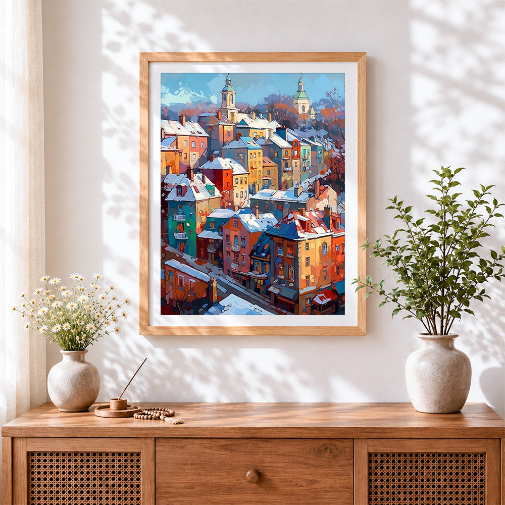 Finished snowy european town with towers cross stitch artwork displayed