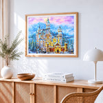 Snowy fairytale castle cross stitch artwork displayed on wall as home decor