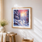 Snowy forest path at sunset cross stitch artwork displayed on wall as home decor