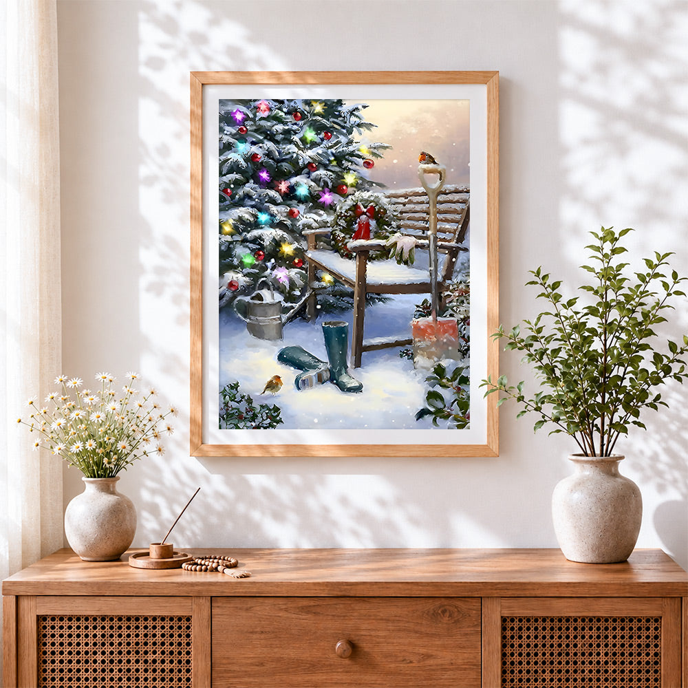 Finished snowy garden bench and robin cross stitch artwork displayed