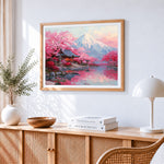 Snowy mountain and pink flower trees paint by numbers artwork displayed on wall as home decor