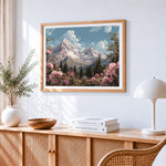 Snowy mountain and pink rhododendrons cross stitch artwork displayed on wall as home decor
