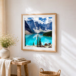 Snowy mountains and turquoise lake paint by numbers artwork displayed on wall as home decor