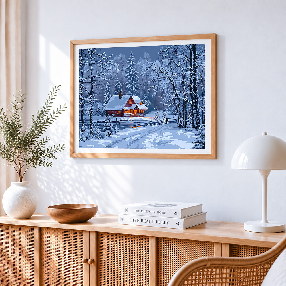 Snowy night red cabin paint by numbers artwork displayed on wall as home decor