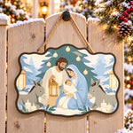 Snowy sacred scene paint by numbers door hanger on a garden gate