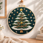Snowy striped christmas tree embroidery hoop wall art displayed as warm and cosy handmade home decor