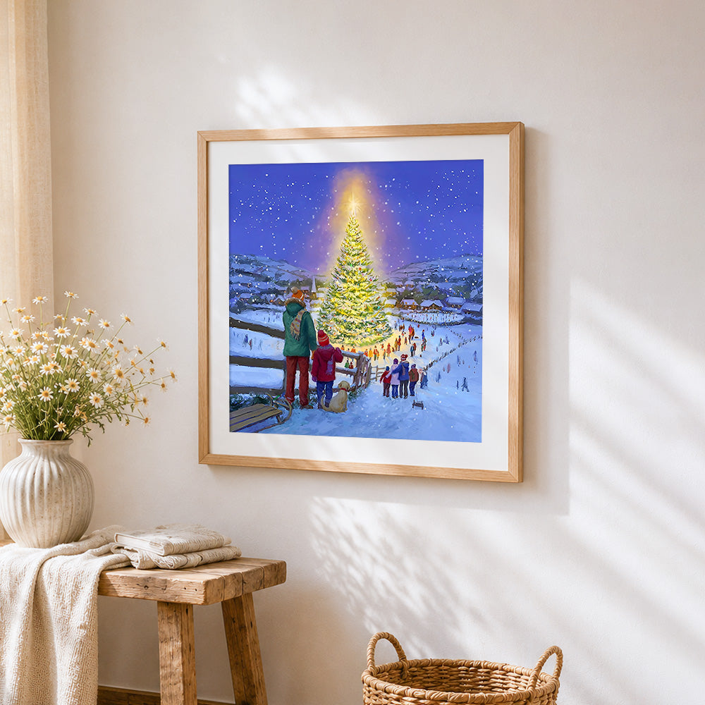 Snowy village with glowing christmas tree paint by numbers artwork displayed on wall as home decor