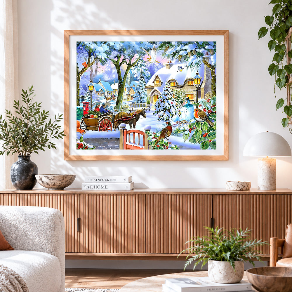 Finished snowy village with horse and cart cross stitch artwork displayed