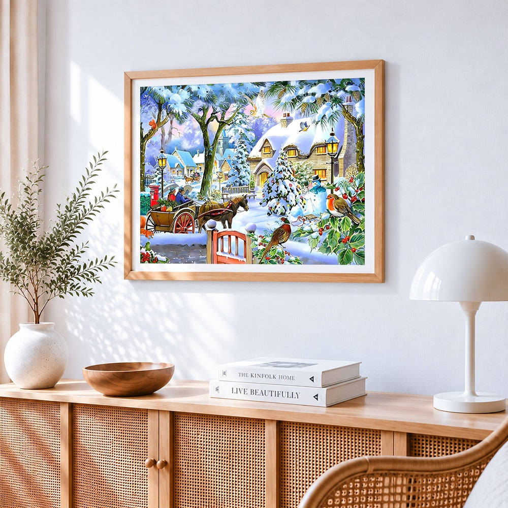 Snowy village with horse and cart cross stitch artwork displayed on wall as home decor