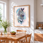 Soft pastel geometric zebra cross stitch artwork displayed on wall as home decor