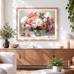 Finished soft pastel roses in a glass vase cross stitch artwork displayed