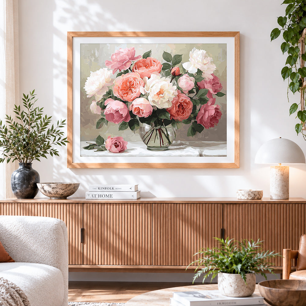 Finished soft pastel roses in a glass vase cross stitch artwork displayed