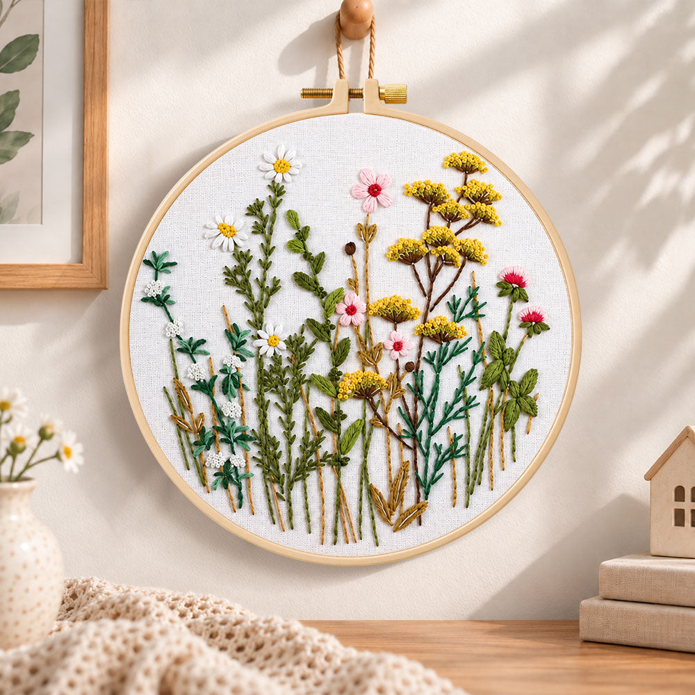 Soft wild daisy mix embroidery hoop wall art displayed as warm and cosy handmade home decor
