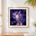 Finished space cat with laser eyes cross stitch artwork displayed