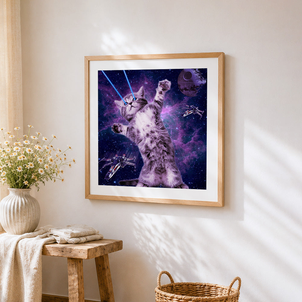 Space cat with laser eyes cross stitch artwork displayed on wall as home decor