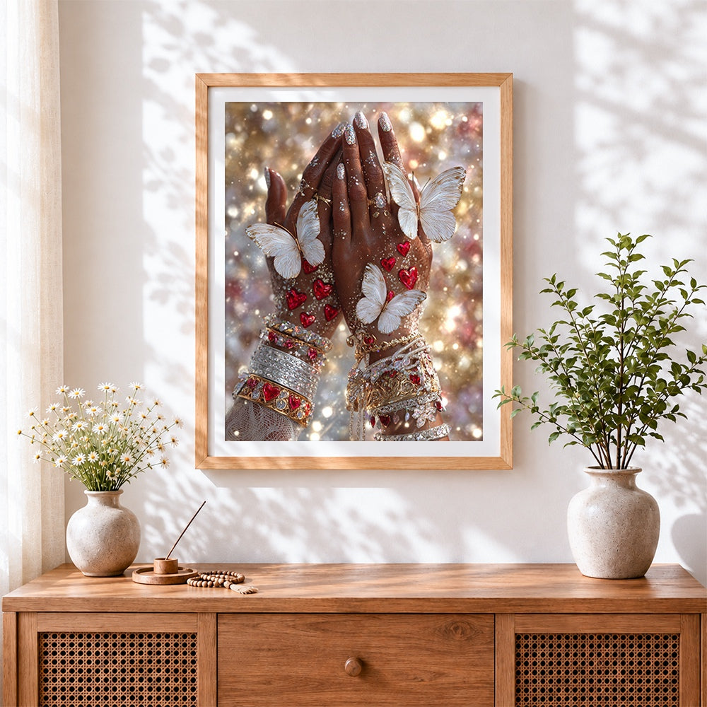Finished sparkling hands with hearts and butterflies cross stitch artwork displayed