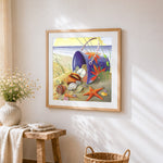 Spilled bucket of seashells on the sand cross stitch artwork displayed on wall as home decor