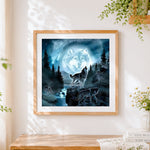 Finished spirit wolf in the moonlight cross stitch artwork displayed