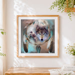 Finished spiritual wolf dreamcatcher cross stitch artwork displayed