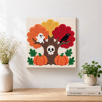 Finished spooky autumn tree artwork displayed on a wall