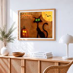 Spooky black cat and jack o lantern cross stitch artwork displayed on wall as home decor