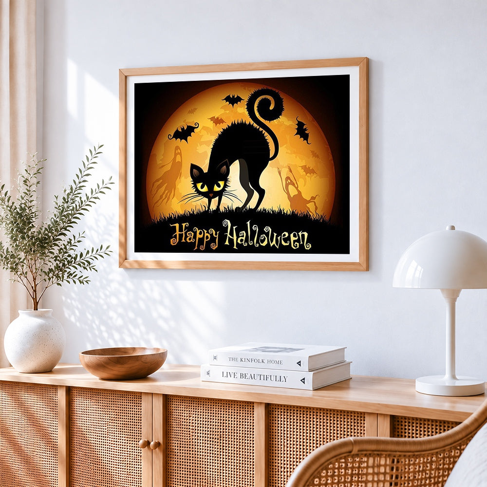 Spooky black cat silhouette with bats cross stitch artwork displayed on wall as home decor