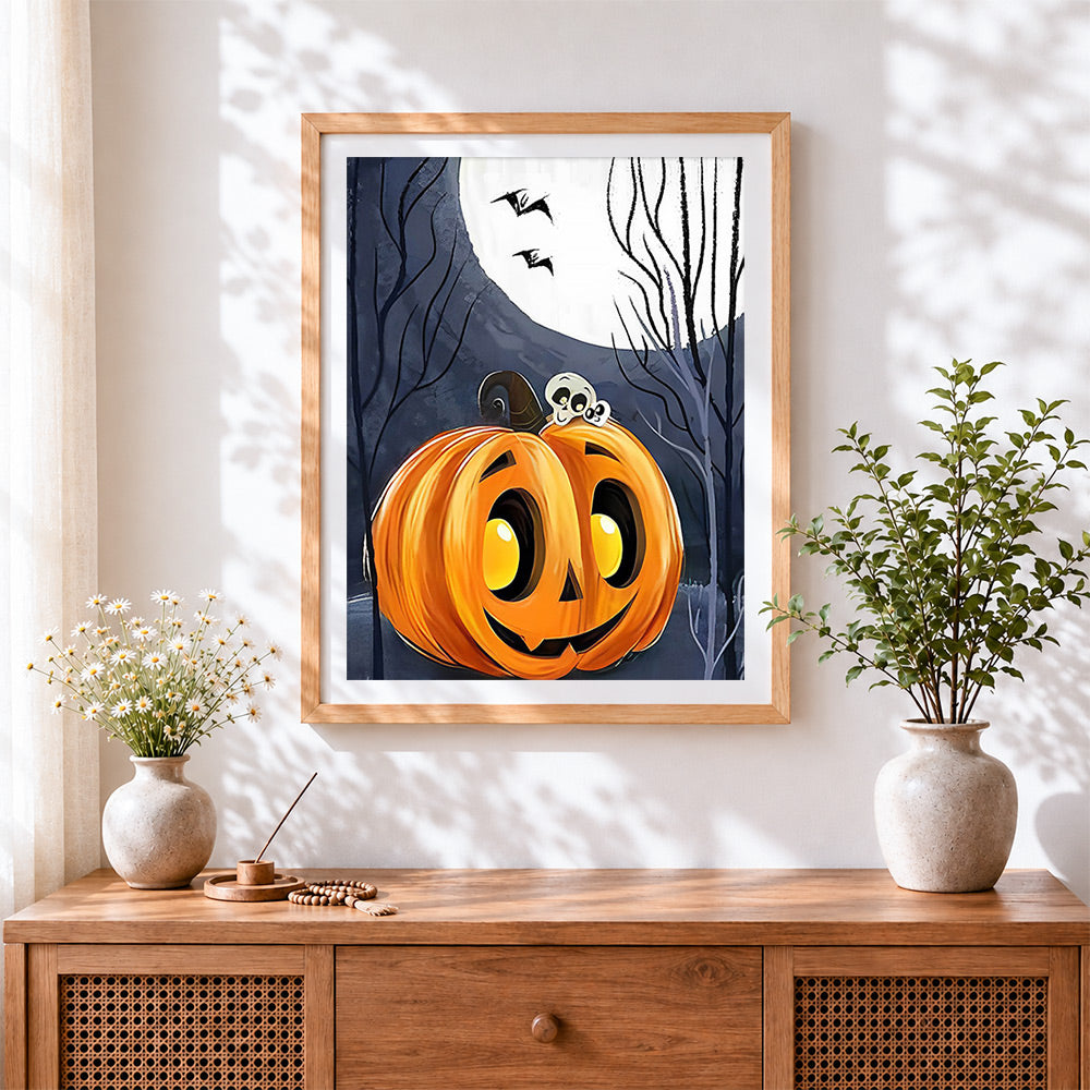 Finished spooky halloween pumpkin and full moon cross stitch artwork displayed