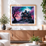 Finished spooky haunted house cross stitch artwork displayed