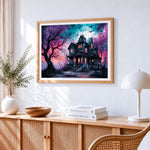 Spooky haunted house cross stitch artwork displayed on wall as home decor