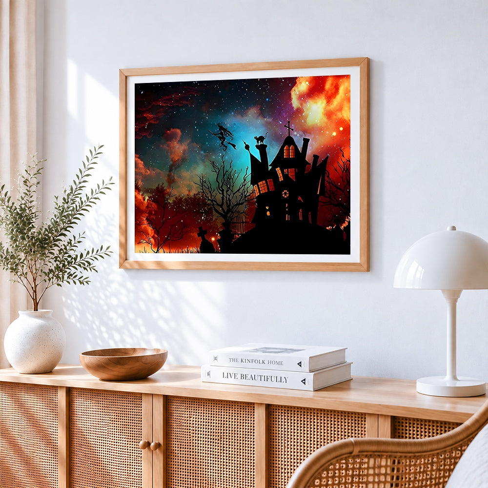 Spooky haunted house silhouette with witch cross stitch artwork displayed on wall as home decor