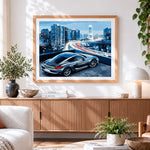 Finished sports car with city skyline cross stitch artwork displayed