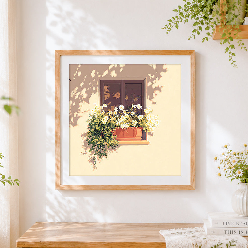 Finished spring daffodils in a window box cross stitch artwork displayed