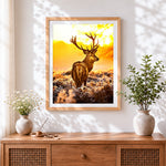 Finished stag in golden sunset cross stitch artwork displayed