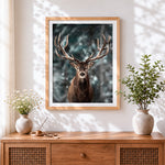 Finished stag in snowfall cross stitch artwork displayed