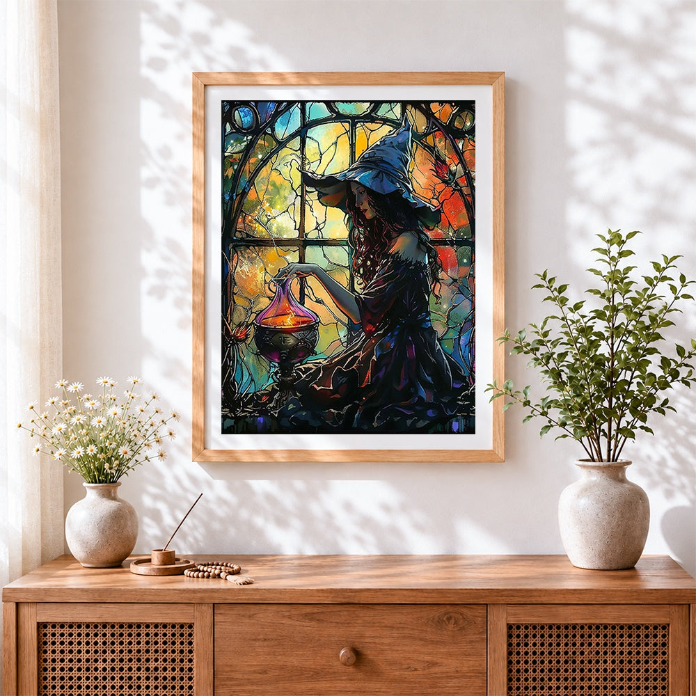 Finished stained glass witch cross stitch artwork displayed
