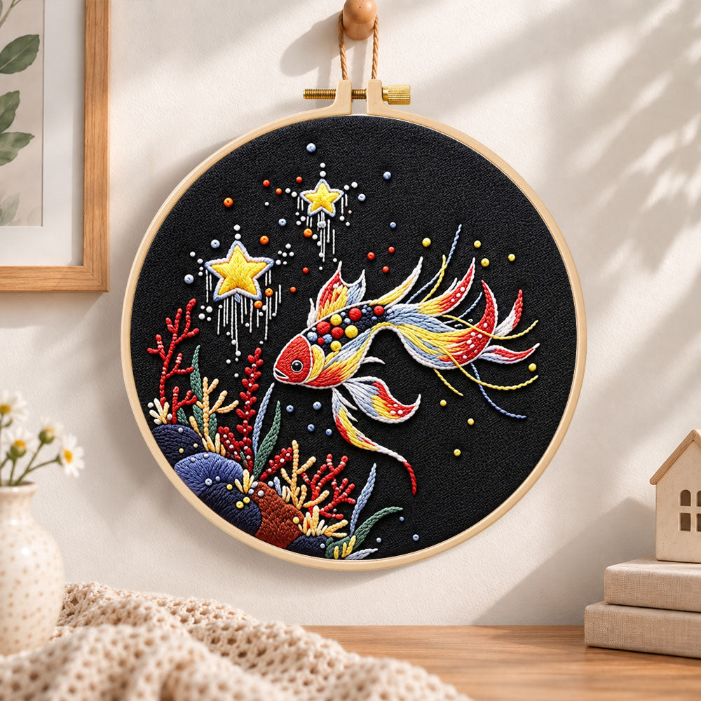 Star and coral koi embroidery hoop wall art displayed as warm and cosy handmade home decor