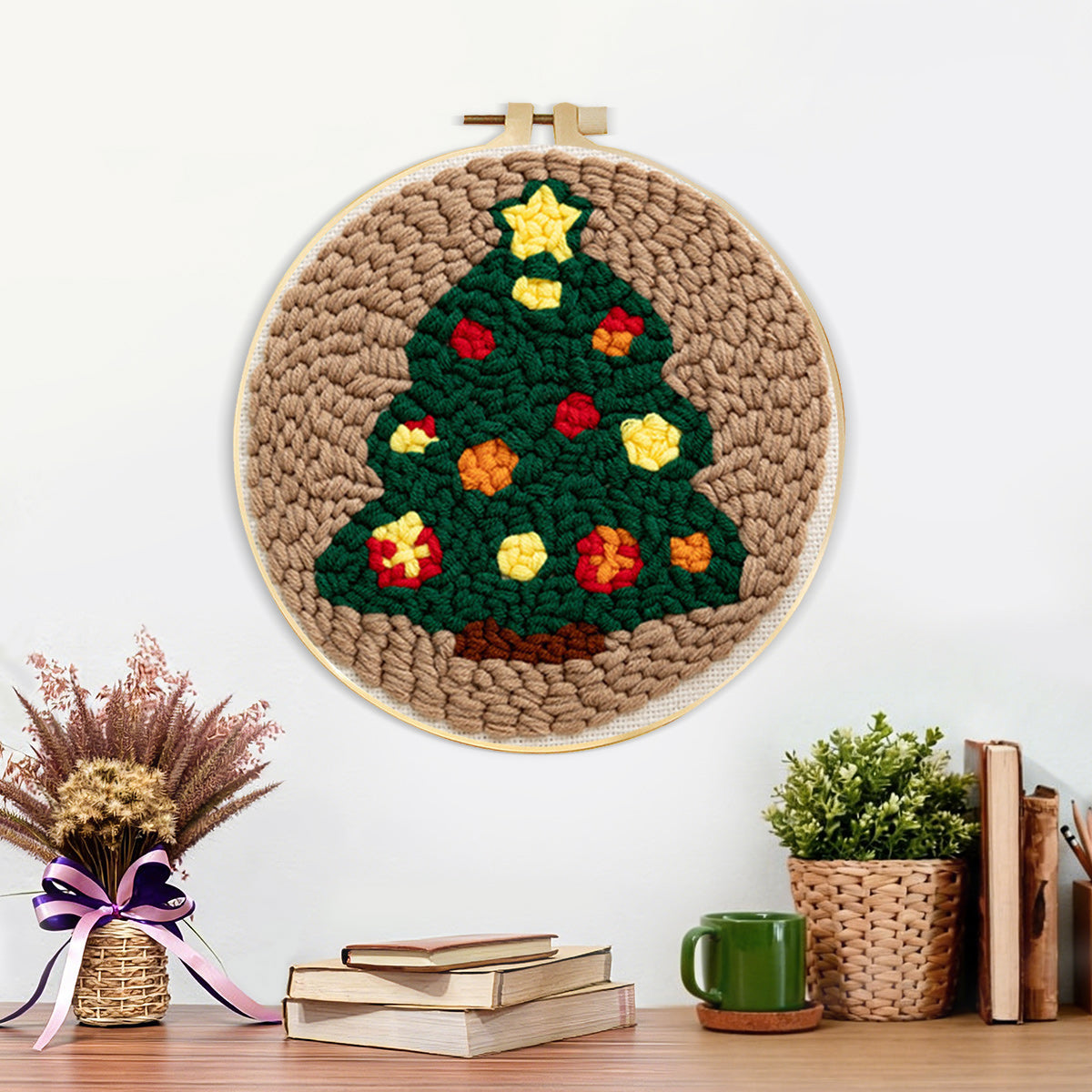 Finished star topped christmas tree artwork displayed on a wall