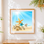 Finished starfish and seashells on a sunny beach cross stitch artwork displayed