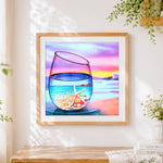 Finished starfish and sunset in a wine glass paint by numbers artwork displayed as home decor